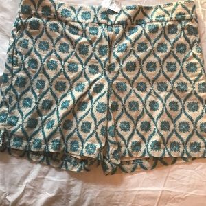 NWT Loft linen shorts with blue stitched pattern.